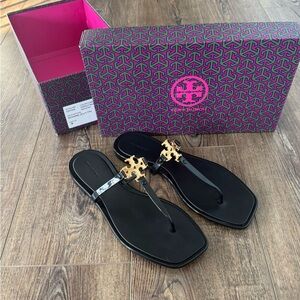 Tory Burch Black Sandals with Gold Accents